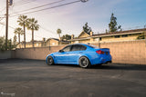 Lowered BMW M3 F80 on eMMOTION suspension lowering springs.