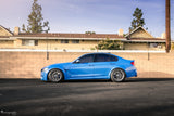 Lowered BMW M3 F80 on eMMOTION suspension lowering springs.